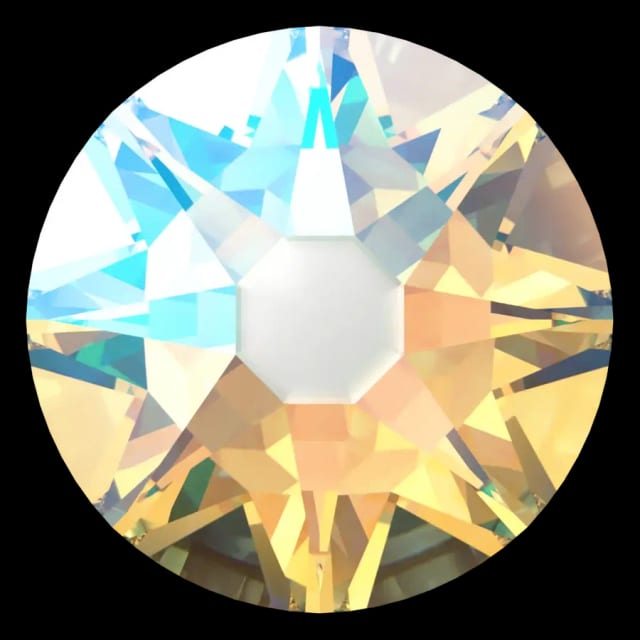 Cristal rond cristal chatoyant pour bijou dentaire, vu de face