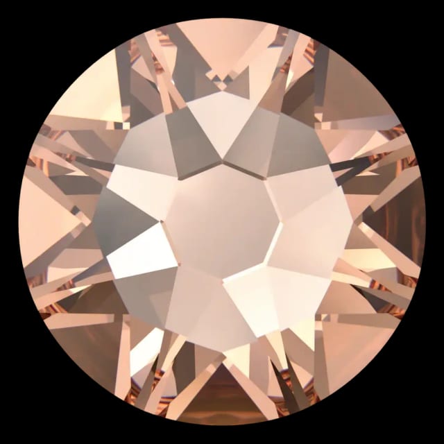 Cristal rond pêche clair pour bijou dentaire, vu de face