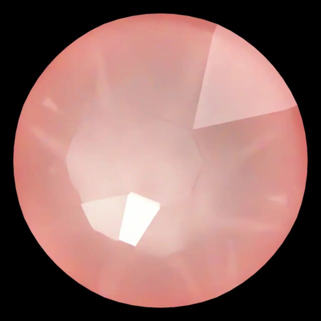 Cristal rond rose flamant pour bijou dentaire, vu de face