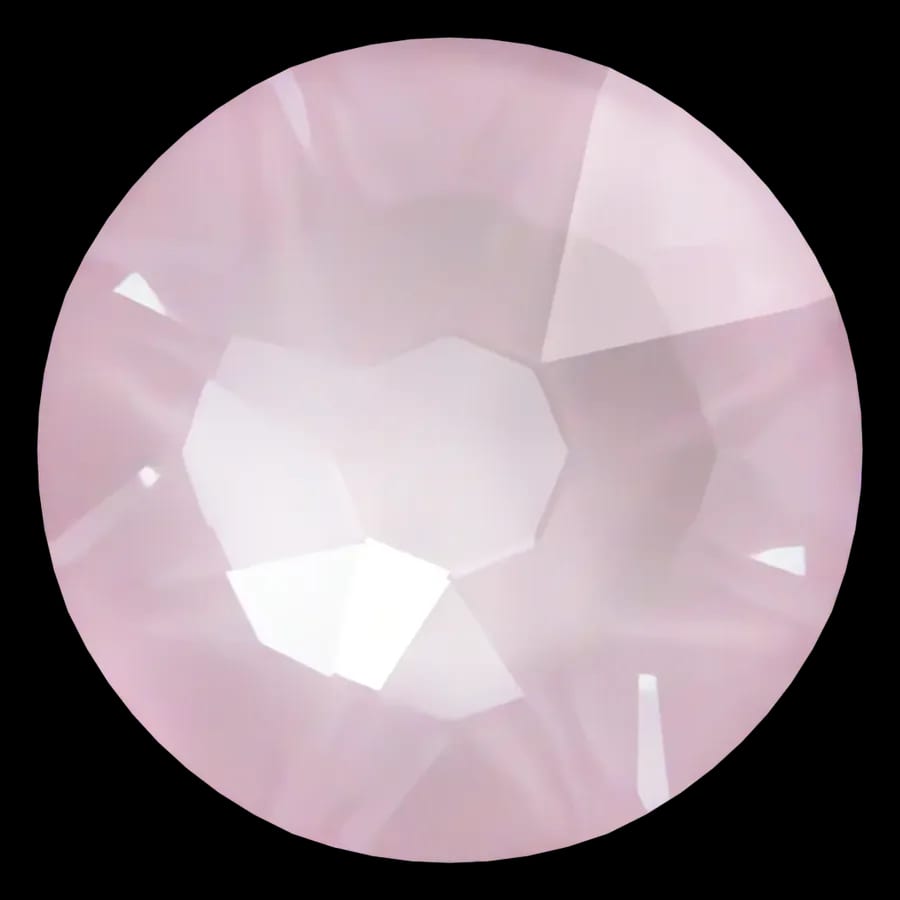 Cristal rond rose tendre pour bijou dentaire, vu de face
