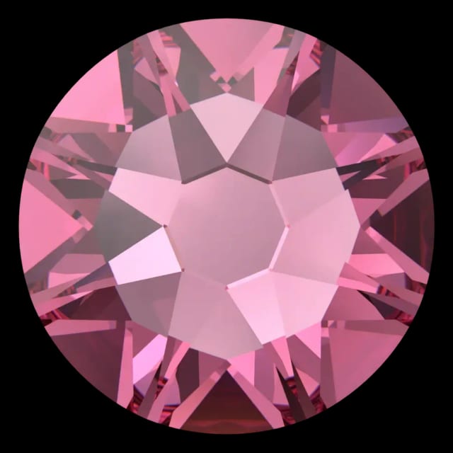 Cristal rond rose vif pour bijou dentaire, vu de face