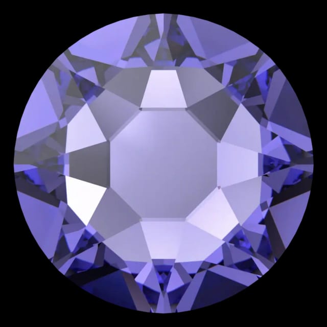 Cristal rond violet tanzanite pour bijou dentaire, vu de face